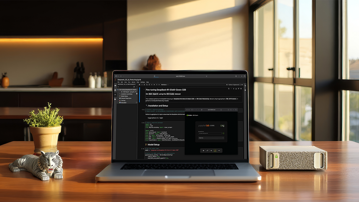 NVIDIA DGX Spark Founders Edition on a desk next to a laptop running a fine-tuning notebook